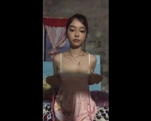 Attractive young Asian woman leaked video at home showing off her sexy body